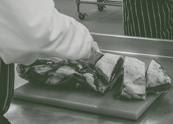Grant chopping British beef by hand