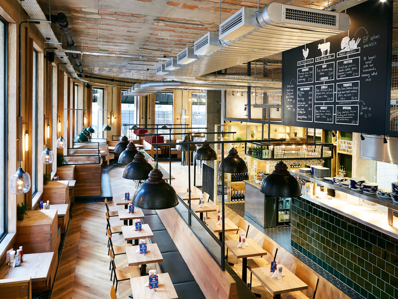 Bottom section inside Honest Burgers Reading including view of kitchen