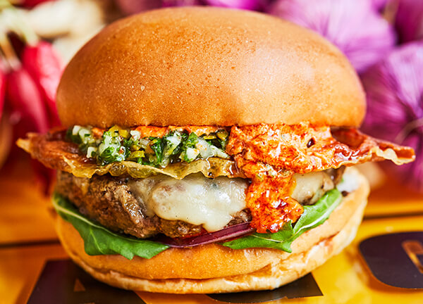 beef burger with Parma ham and mozzarella