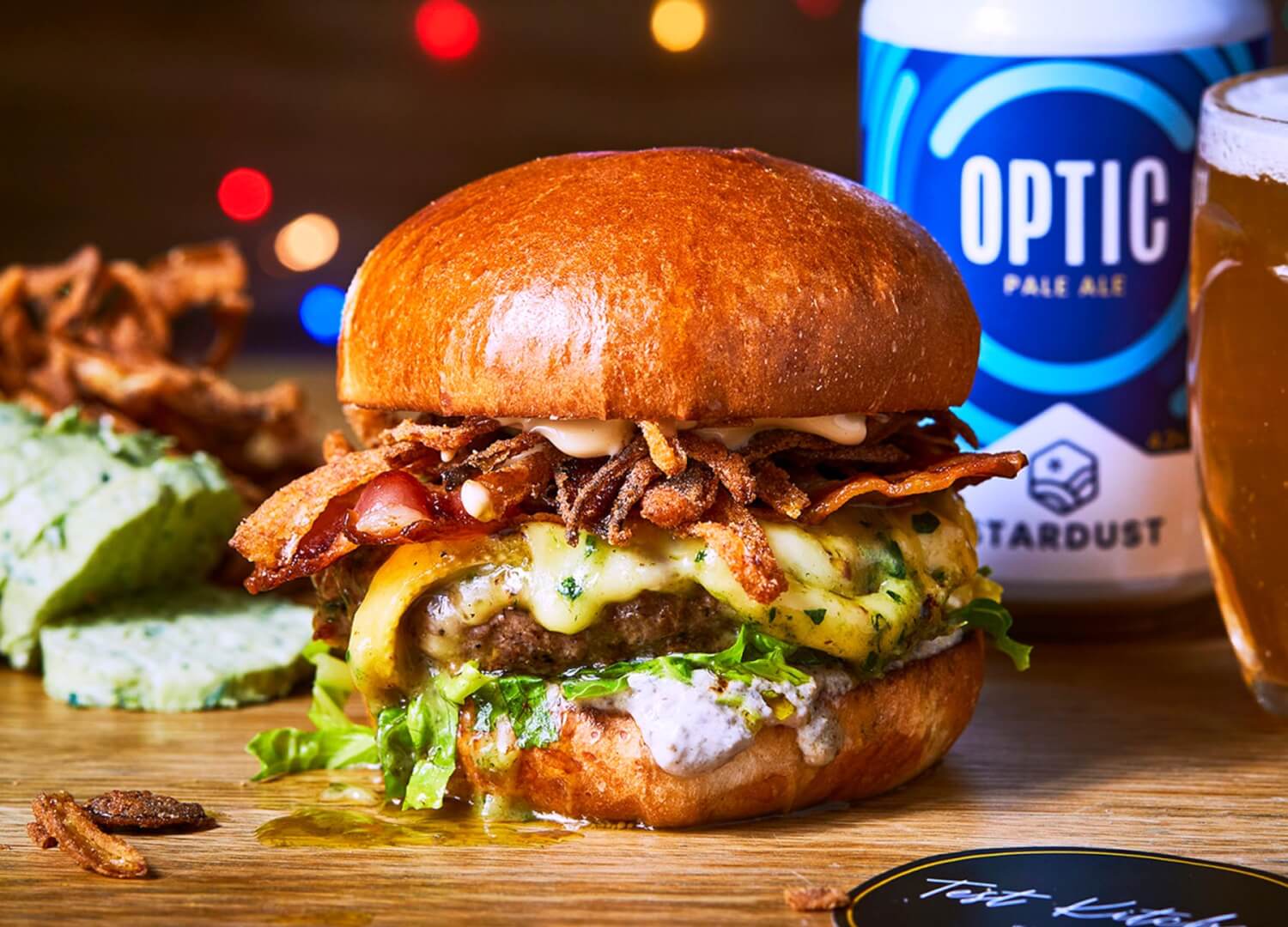 windsor beef burger with waterloo cheese, bacon, miso, onion, mushroom and mayo collab with test kitchen