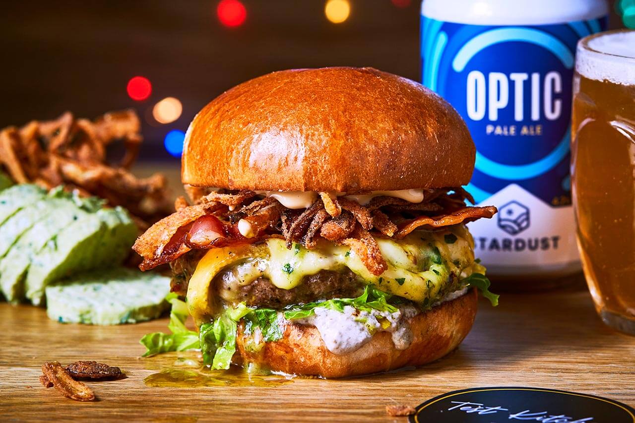 windsor beef burger with waterloo cheese, bacon, miso, onion, mushroom and mayo collab with test kitchen