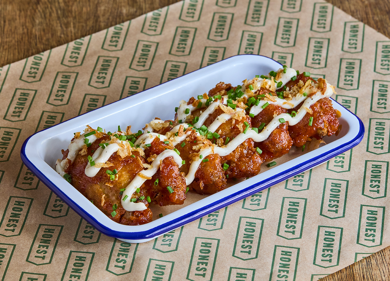 BBQ Sriracha wings with confit garlic mayo